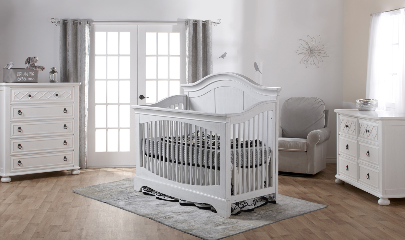 The <b>Enna Forever Crib</b> is a sweet and stylish piece that coordinates nicely with several Pali collections. Here shown with the Siracusa cases, in Vintage White. 
